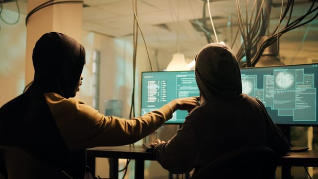Team of hackers using trojan virus to exploit computer server