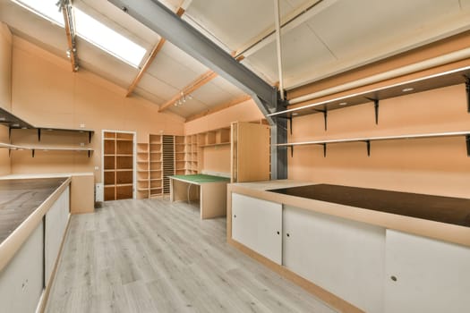 a large storage room with shelves and counters in it