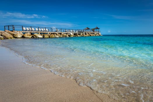 Tropical caribbean beach with turquoise waters in Montego Bay, Jamaica