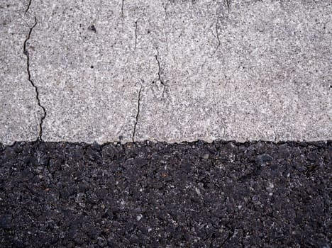 Close-up the cracked on the surface of Road Line painted