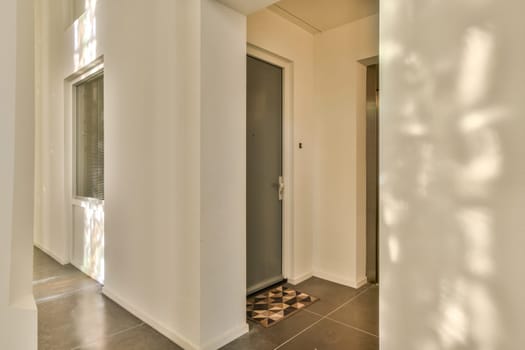 a door is open to a hallway with a door