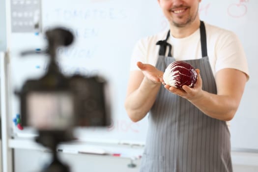 Chef blogger broadcasts on camera and talks about healthy eating