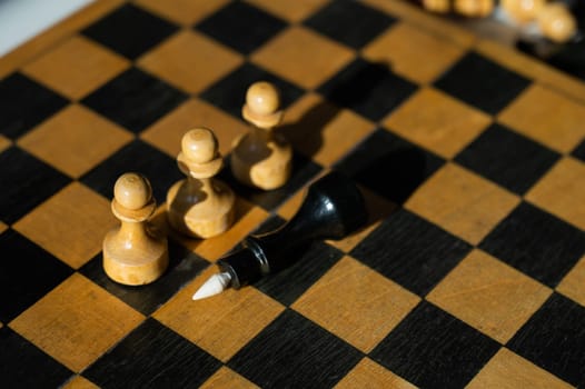 Close-up of chess pieces on the board.