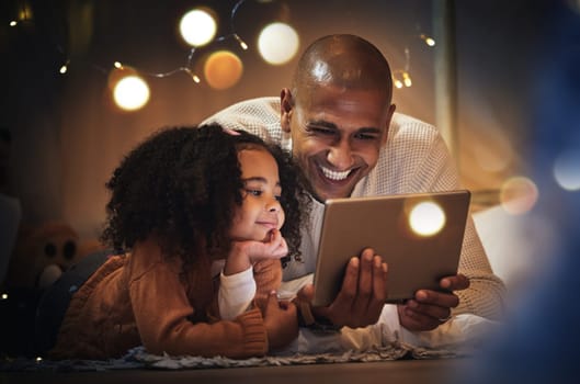 Night, tablet and relax with father and daughter in blanket tent for connection, happy and streaming cartoon. Smile, app and fairy lights with man and girl at home for education, internet and online.