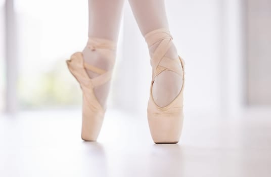 In tune with the music. a ballet dancers pointe shoes.