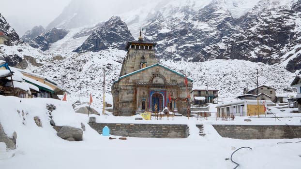 Kedarnath temple during winter and snow fall in Uttarakhand.