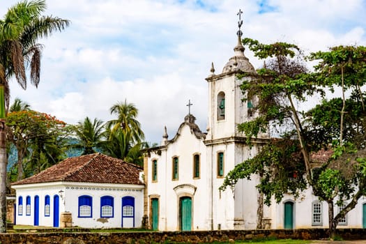 Church between th vegetation in the ancient and historic city of Paraty