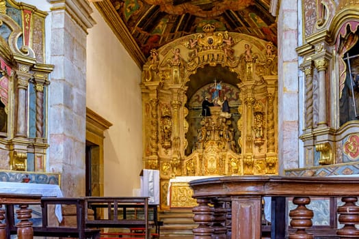 Old baroque church with gold-leafed walls