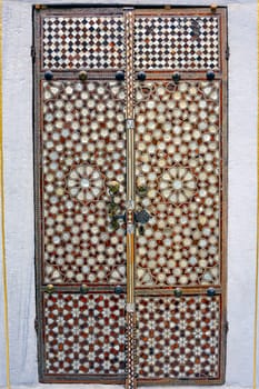 Portal with wood and mother-of-pearl mosaic