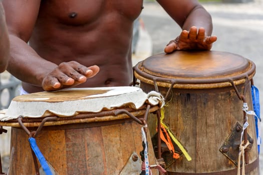 Musician playing brazilian atabaque
