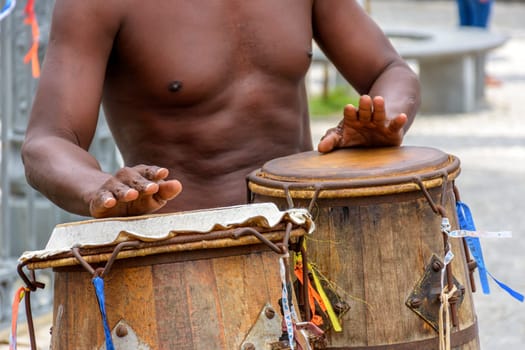 Musician playing atabaque