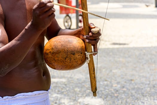 Musicians playing instruments used in brazilian capoeira