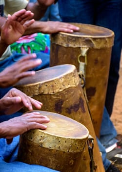 Percussionists group playing a rudimentary atabaque