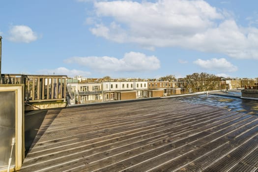 a view of a dock with buildings in the background