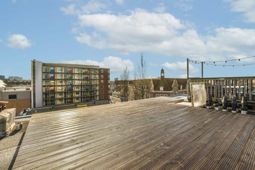 the roof of a building with a wooden deck and