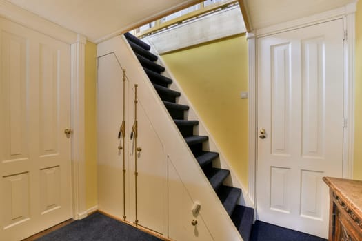the stairs leading up to the attic in a home