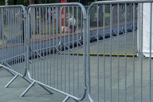 Metal fences at mass events protect people.