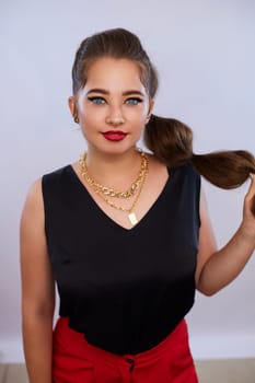 portrait shot of a young Ukrainian woman on the background, after make-up and hairstyle, for clothing advertising
