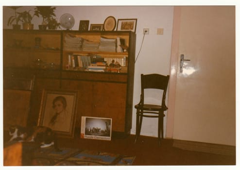 Retro photo shows an ancient room.