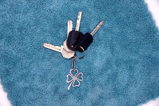 A bunch of keys with a keychain