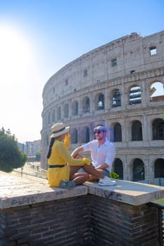 couple mid age on a city trip in Rome Italy Europe,Colosseum Coliseum building in Rome, Italy