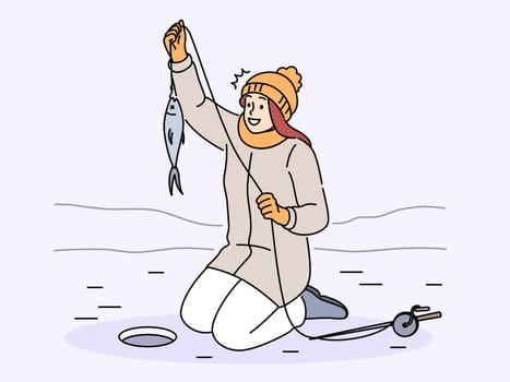 Smiling catch fish on winter river