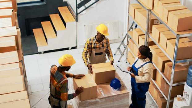 African american people packing products in boxes