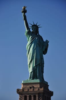Vertical shot of the Statue of Liberty in New York