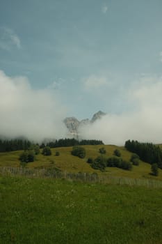 Beautiful scenic view of the Mountains with a cloudy sky