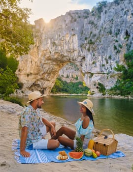 couple on vacation in the Ardeche France Pont d Arc, view of Narural arch Pont D'arc Canyon France