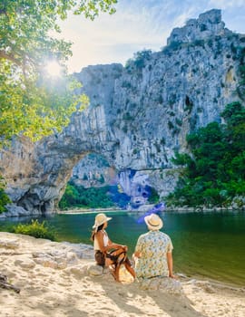 couple on vacation in the Ardeche France Pont d Arc, view of Narural arch Pont D'arc Canyon France