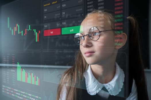 Portrait of a caucasian girl in glasses in a classroom near a blackboard against the background of stock charts on a virtual screen.