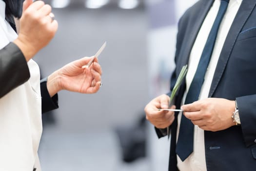 Business people exchanging business card on business meeting, Business discussion talking deal concept