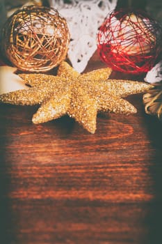 Christmas star and other ornaments in vintage toning