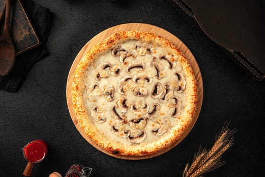 Top view on pizza with mushrooms and cheese