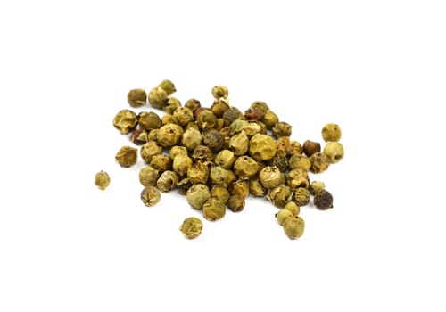 Heap of green peppercorns isolated