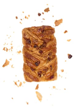 Rectangular pastry made from puff pastry with maple syrup and pecan nuts on a white background, surrounded by crumbs