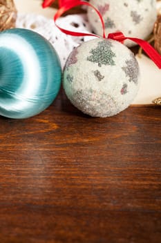 Christmas balls decorations on wooden table