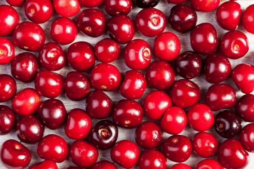 Bunch of cherries on wooden table