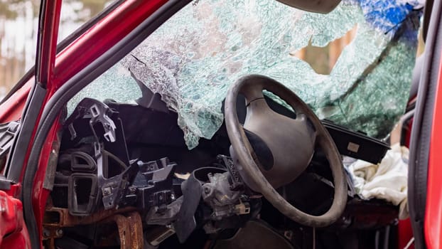 Broken windshield from a car accident. The windshield of the car was broken. Broken windproof car accident. Car accident. A window repair company will come to you to replace the broken glass.