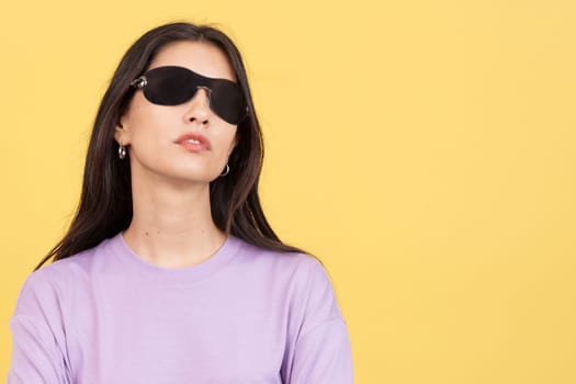 Rude woman with sunglasses looking at camera