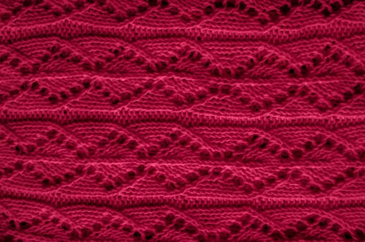 Organic knitting background with detail wool threads.