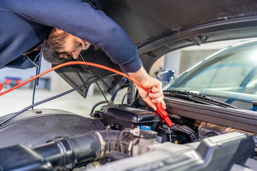 charging the car battery using electric cables
