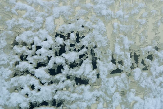 The surface of the window in the snow in bad weather.