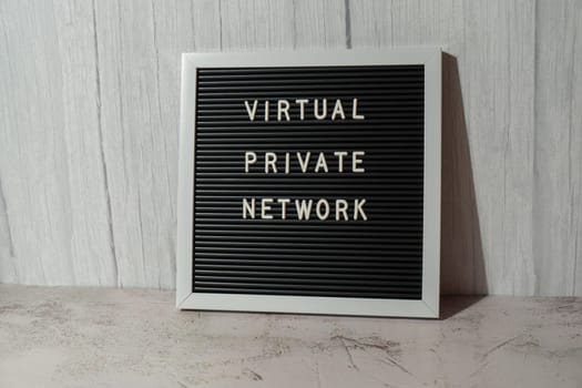 Letter board with text of VIRTUAL PRIVATE NETWORK VPN creation Internet protocols for protection private network anonymous safe and secure internet access on gadgets