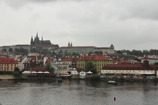 View of the Vltava River and Charles Bridge in the rain. Prague, Czech Republic
