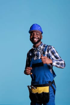 Excited african american man in hard hat