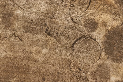 Brown concrete or cement material in abstract wall background texture.