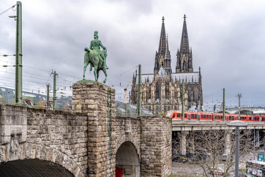 Cologne, Germany - March 23, 2023: Cathedral of St. Peter and Mary, Equestrian statue of Emperor William, main station