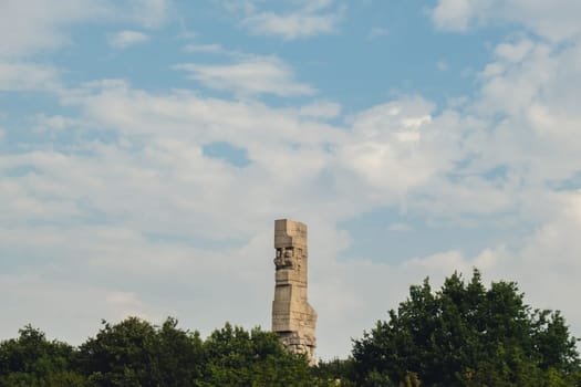 Gdansk, Poland - May 2022. Westerplatte Monument in memory of the Polish defenders. Westerplatte peninsula is famous for the first battle of the European theater of World War II in 1939. View from Motlawa river. Travel Touristic destination